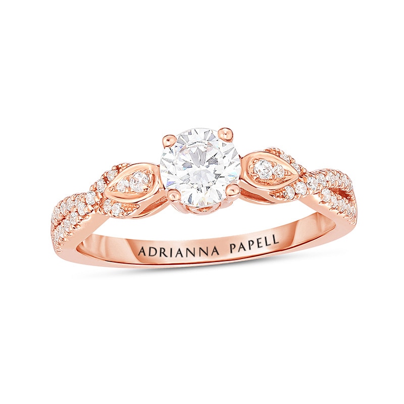Previously Owned - Adrianna Papell 5/8 CT. T.W. Diamond Twist Shank Engagement Ring in 14K Rose Gold (I/I1)