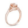 Thumbnail Image 1 of Previously Owned - Oval Morganite and 1/5 CT. T.W. Diamond Frame Buckle Ring in 14K Rose Gold