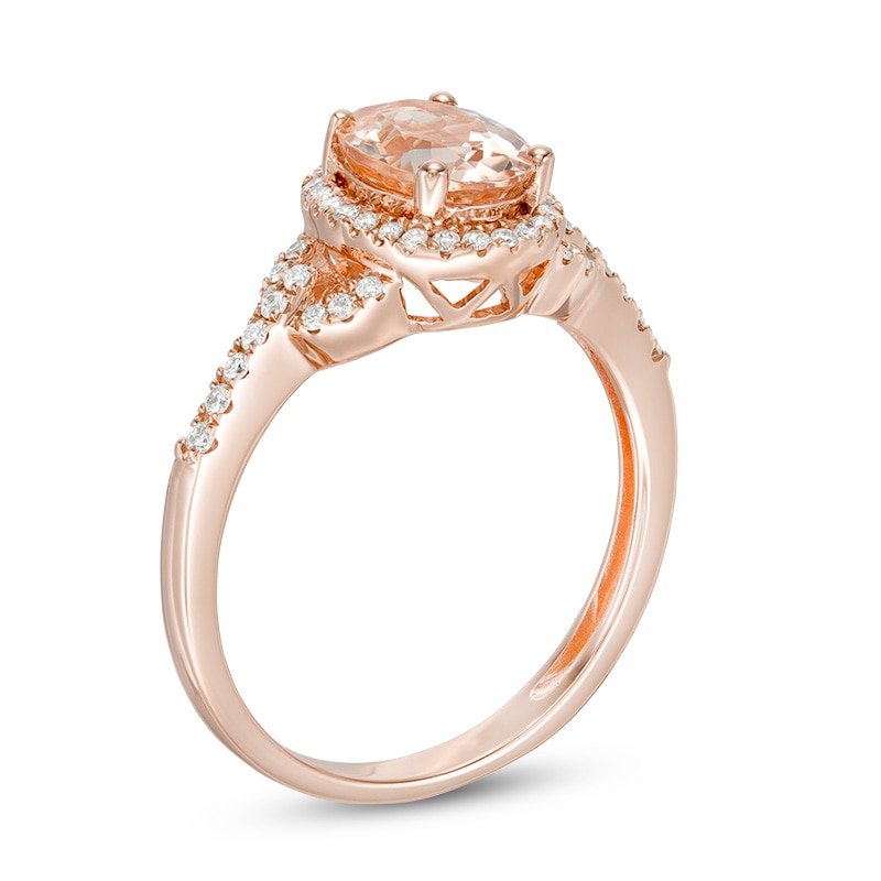 Previously Owned - Oval Morganite and 1/5 CT. T.W. Diamond Frame Buckle Ring in 14K Rose Gold