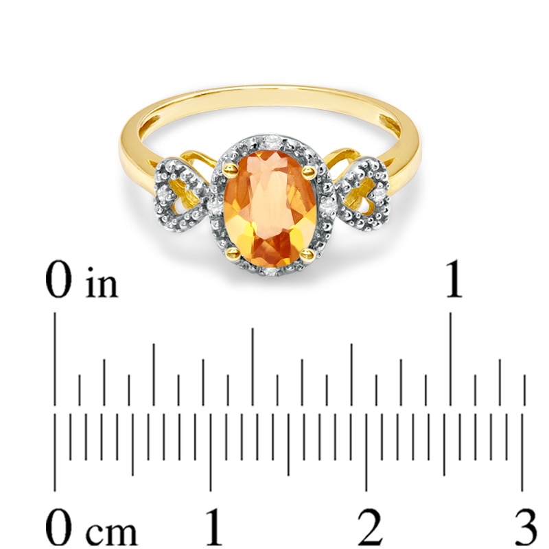 Previously Owned - Oval Citrine and Diamond Accent Ring in 10K Gold