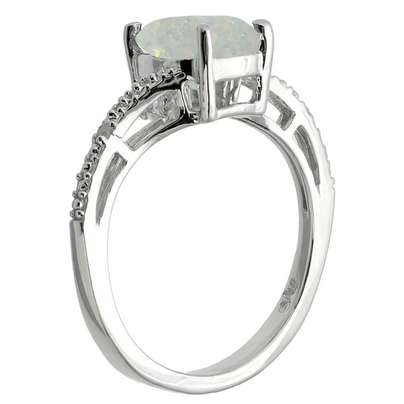 Previously Owned - Oval Lab-Created Opal and Diamond Accent Ring in Sterling Silver