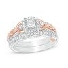 Thumbnail Image 0 of Previously Owned - 5/8 CT. T.W. Princess-Cut Diamond Frame Interlocking Bridal Set in 10K Two-Tone Gold