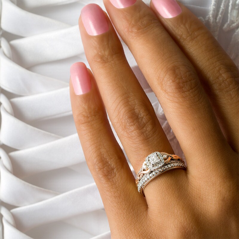 Previously Owned - 5/8 CT. T.W. Princess-Cut Diamond Frame Interlocking Bridal Set in 10K Two-Tone Gold