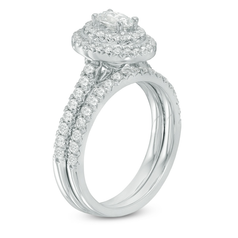 Previously Owned - 1-1/4 CT. T.W. Oval Diamond Double Frame Bridal Set in 14K White Gold