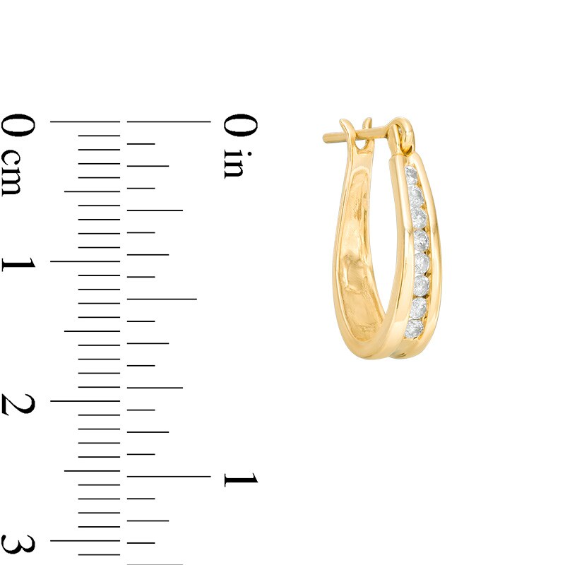 Main Image 2 of Previously Owned - 1/4 CT. T.W. Channel-Set Diamond Oval Hoop Earrings in 14K Gold