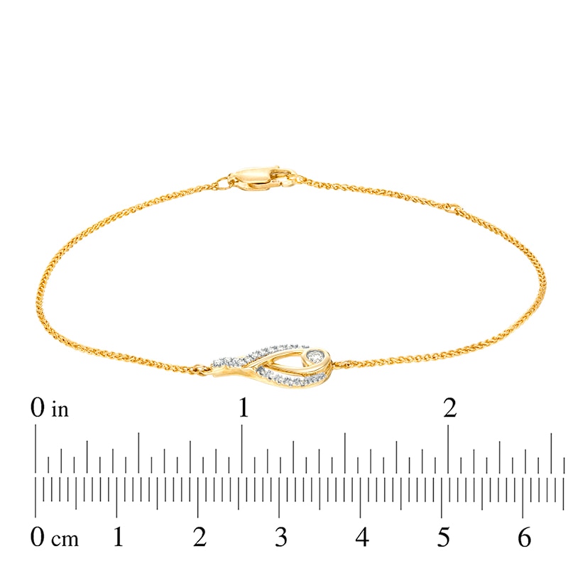 Previously Owned - Interwoven™ 1/6 CT. T.W. Diamond Bracelet in 10K Gold - 7.75"