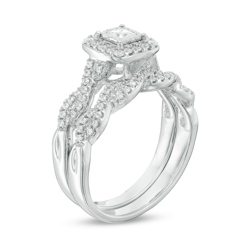 Previously Owned - 5/8 CT. T.W. Princess-Cut Diamond Frame Twist Bridal Set in 10K White Gold
