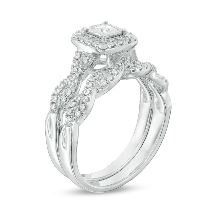 Main Image 2 of Previously Owned - 5/8 CT. T.W. Princess-Cut Diamond Frame Twist Shank Bridal Set in 10K White Gold