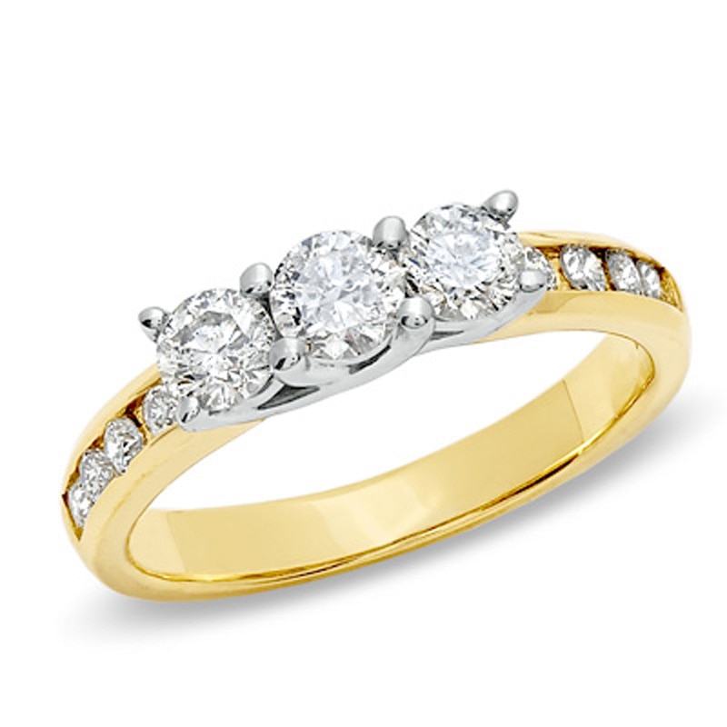 Previously Owned - 1 CT. T.W. Diamond Past Present Future® Engagement Ring in 10K Gold