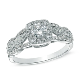 Previously Owned - Celebration Ideal 3/4 CT. T.W. Diamond Twist Frame Engagement Ring in 14K White Gold (I/I1)