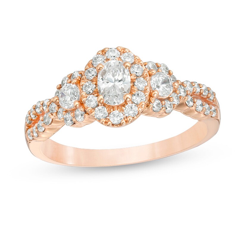 Main Image 1 of Previously Owned - Celebration Ideal 1 CT. T.W. Oval Diamond Three Stone Engagement Ring in 14K Rose Gold (I/I1)