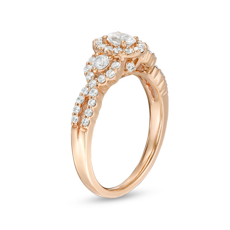 Main Image 2 of Previously Owned - Celebration Ideal 1 CT. T.W. Oval Diamond Three Stone Engagement Ring in 14K Rose Gold (I/I1)
