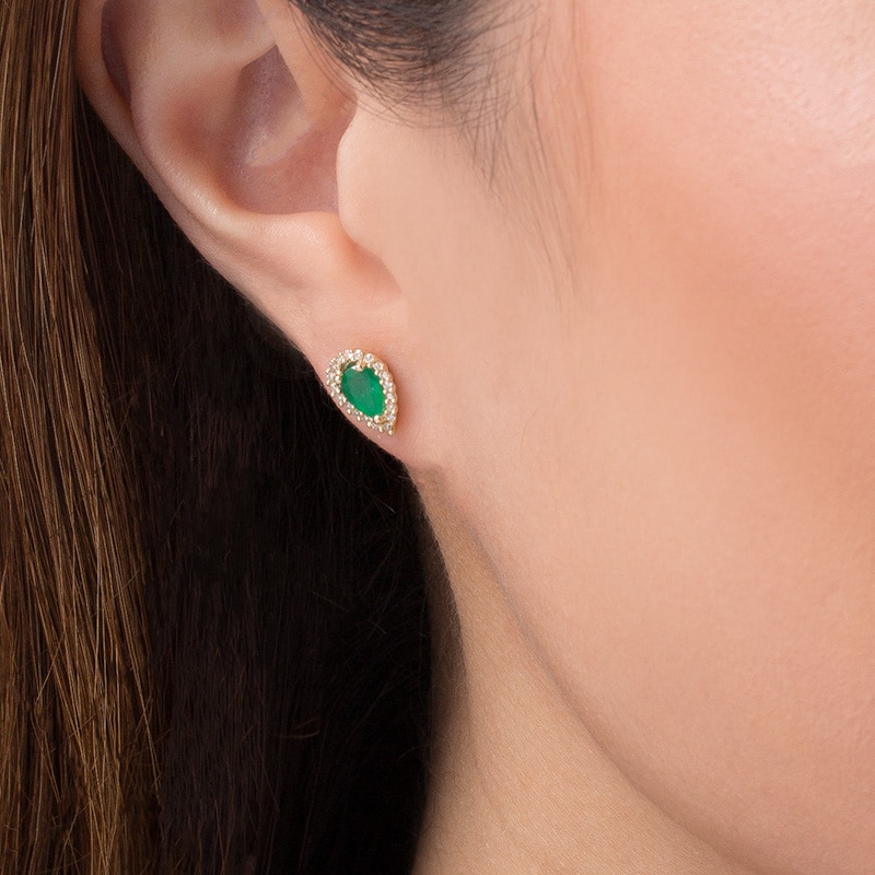 Previously Owned - Pear-Shaped Emerald and 1/8 CT. T.W. Diamond Frame Stud Earrings in 10K Gold