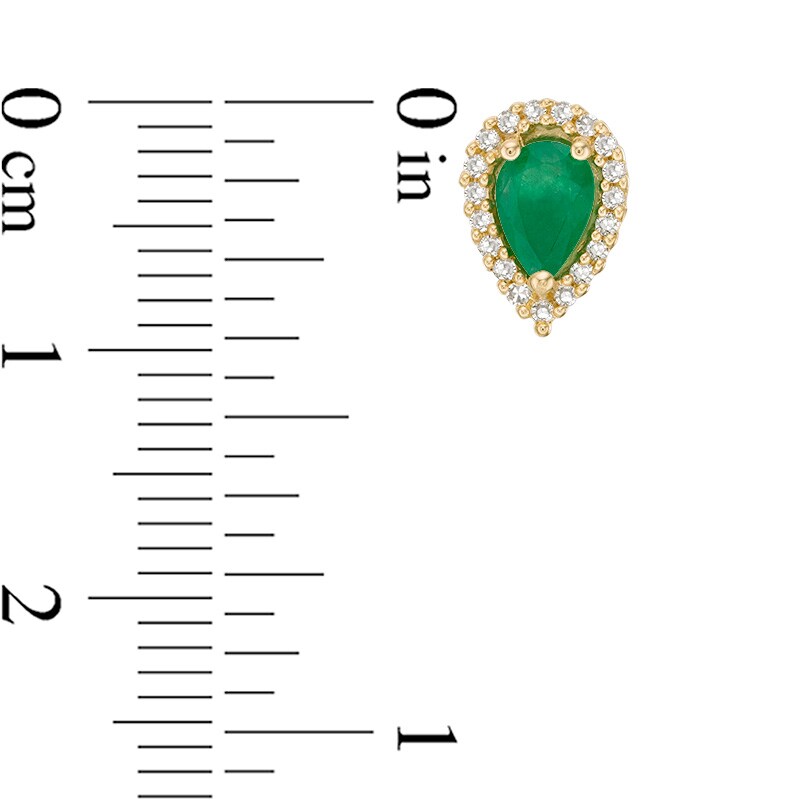 Previously Owned - Pear-Shaped Emerald and 1/8 CT. T.W. Diamond Frame Stud Earrings in 10K Gold