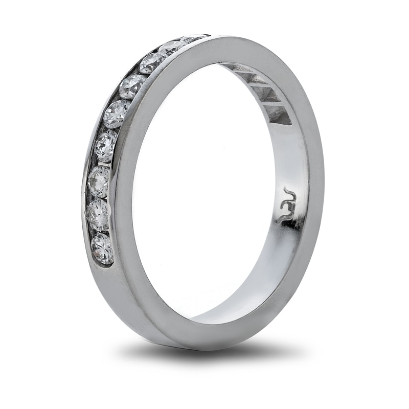 Previously Owned - 1/4 CT. T.W. Diamond Nine Stone Wedding Band in Platinum (H/SI1)