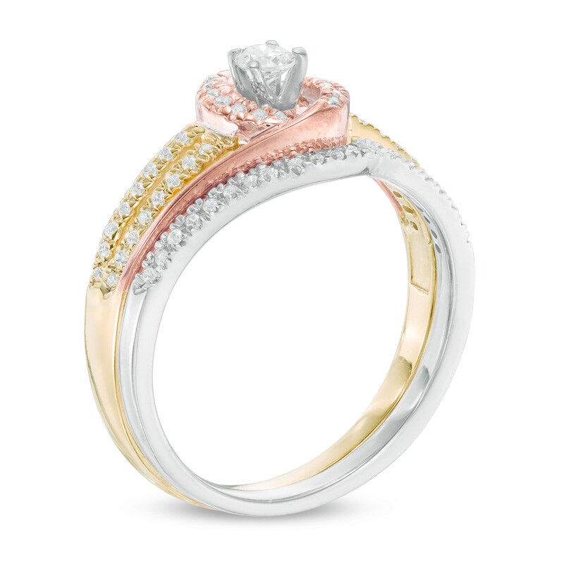 Main Image 2 of Previously Owned - 1/3 CT. T.W. Diamond Swirl Bridal Set in 10K Tri-Tone Gold