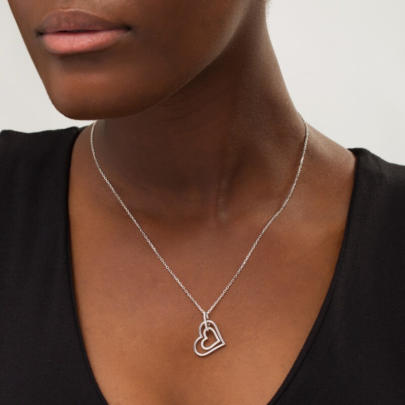 Previously Owned - Vera Wang Love Collection 1/6 CT. T.W. Diamond Interlocking Heart Necklace in Sterling Silver - 19"