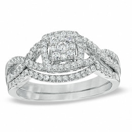 Previously Owned 1/2 CT. T.W. Diamond Cluster Twist Shank Soldered Bridal Set in 10K White Gold