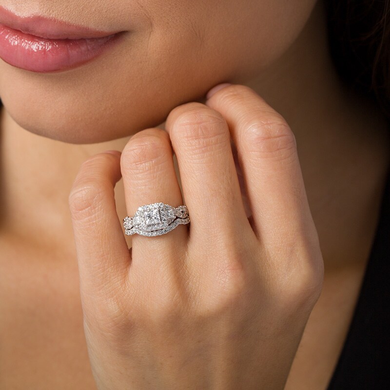 Main Image 2 of Previously Owned - 1-1/2 CT. T.W. Princess-Cut Diamond Three Stone Frame Twist Bridal Set in 10K White Gold