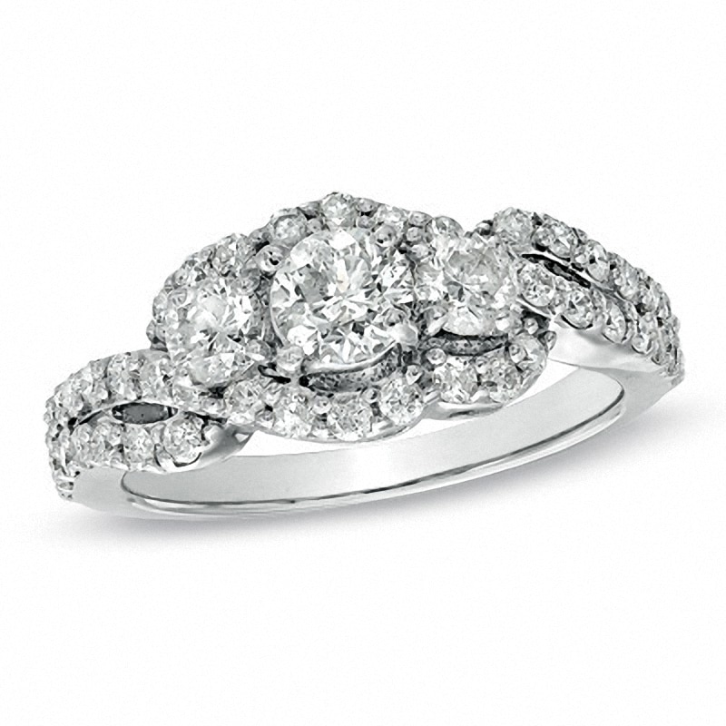 Main Image 1 of Previously Owned - 1-1/2 CT. T.W. Diamond Three Stone Frame Ring in Platinaire®