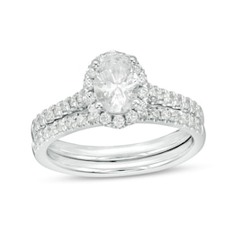 Previously Owned - 1-1/5 CT. T.W.   Oval center Diamond Frame Bridal Set in 14K White Gold (I/SI2)