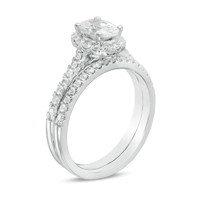 Main Image 2 of Previously Owned - 1-1/5 CT. T.W.   Oval center Diamond Frame Bridal Set in 14K White Gold (I/SI2)