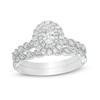 Thumbnail Image 1 of Previously Owned - 3/4 CT. T.W. Oval Diamond Double Frame Twist Vintage-Style Bridal Set in 14K White Gold