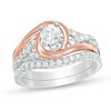 Thumbnail Image 0 of Previously Owned - 1 CT. T.W. Diamond Layered Bypass Swirl Bridal Set in 14K Two-Tone Gold
