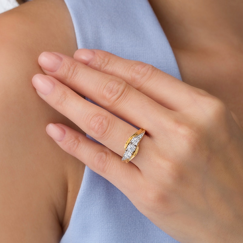 Main Image 3 of Previously Owned - 1/4 CT. T.W. Diamond Past Present Future® Bypass Engagement Ring in 10K Gold