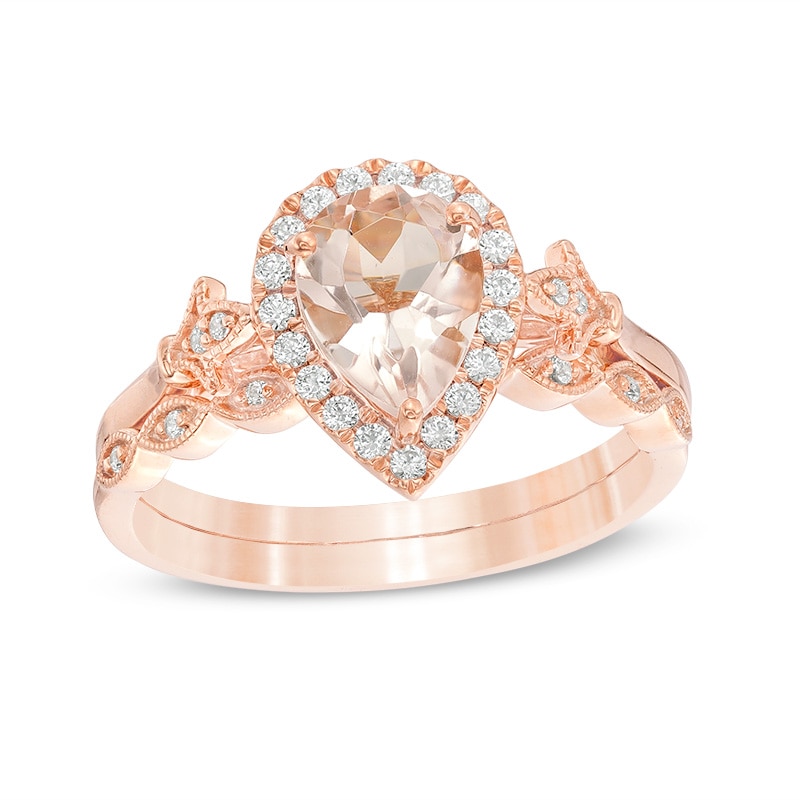 Previously Owned - Pear-Shaped Morganite and 1/5 CT. T.W. Diamond Frame Fleur-de-Lis Bridal Set in 10K Rose Gold