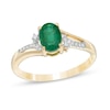 Thumbnail Image 0 of Previously Owned - Oval Emerald and 1/20 CT. T.W. Diamond Vintage-Style Split Shank Ring in 10K Gold