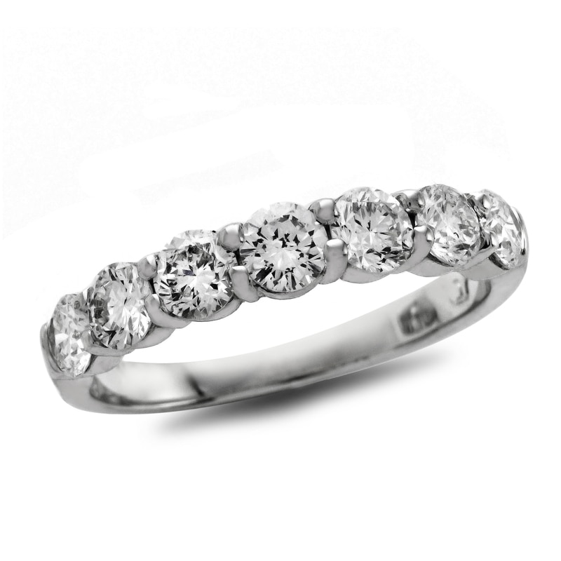 Previously Owned - 3/4 CT. T.W. Diamond Seven Stone Wedding Band in Platinum (H/SI1)