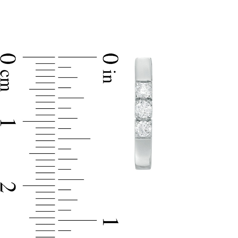 Previously Owned - 3/8 CT. T.W. Diamond Three Stone Hoop Earrings in 10K White Gold