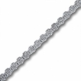 Previously Owned - 1 CT. T.W. Diamond Flower Tennis Bracelet in 10K White Gold