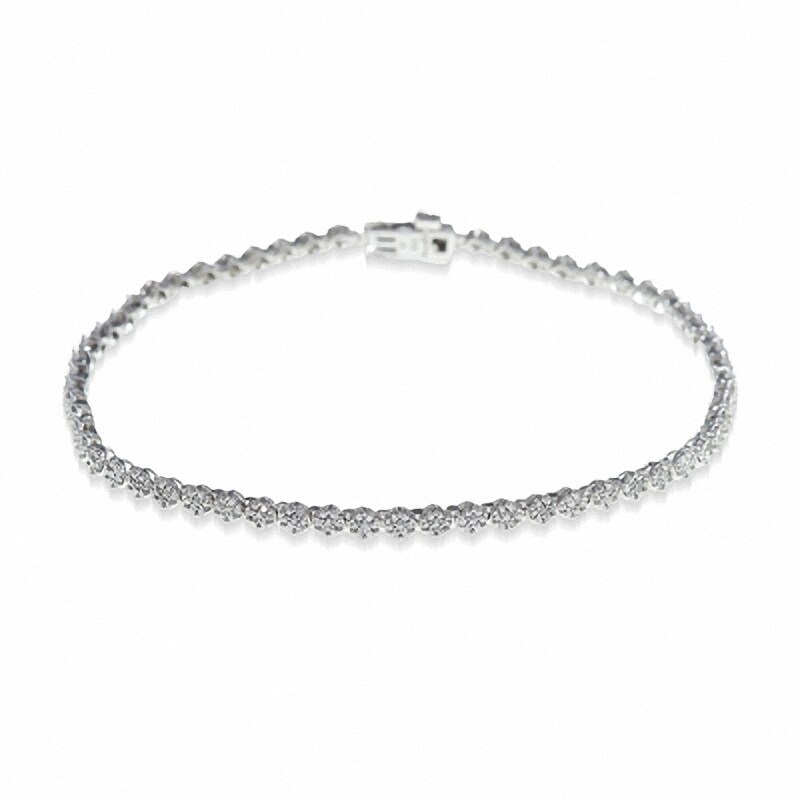 Previously Owned - 1 CT. T.W. Diamond Flower Tennis Bracelet in 10K White Gold