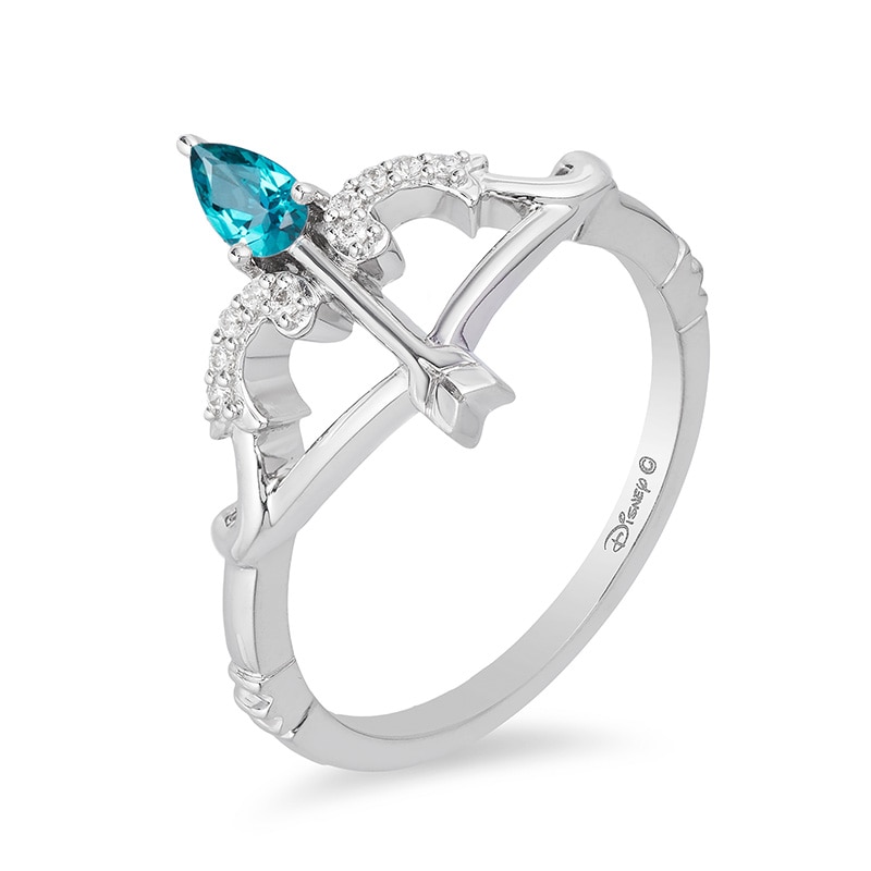 Previously Owned - Enchanted Disney Merida Pear-Shaped Blue Topaz and 1/20 CT. T.W. Diamond Bow and Arrow Ring