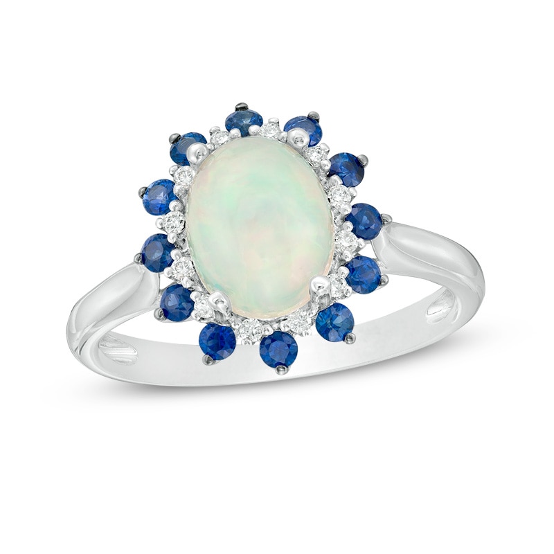 Previously Owned - Oval Opal, Blue Sapphire and 1/15 CT. T.W. Diamond Double Sunburst Frame Ring in 10K White Gold