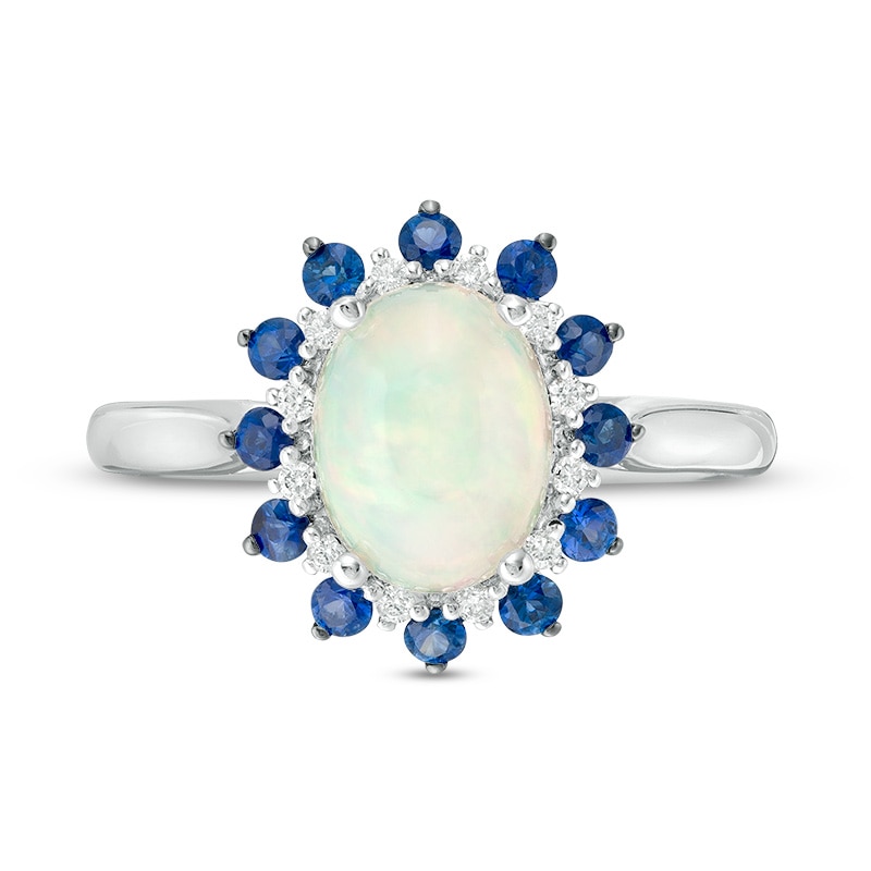 Previously Owned - Oval Opal, Blue Sapphire and 1/15 CT. T.W. Diamond Double Sunburst Frame Ring in 10K White Gold