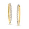 Previously Owned - 1/2 CT. T.W. Diamond Oval Hoop Earrings in 10K Gold