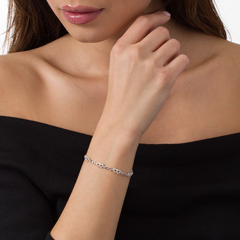 Main Image 2 of Previously Owned - 1/10 CT. T.W. Diamond Alternating Double Heart and Infinity Bracelet in Sterling Silver - 7.25"