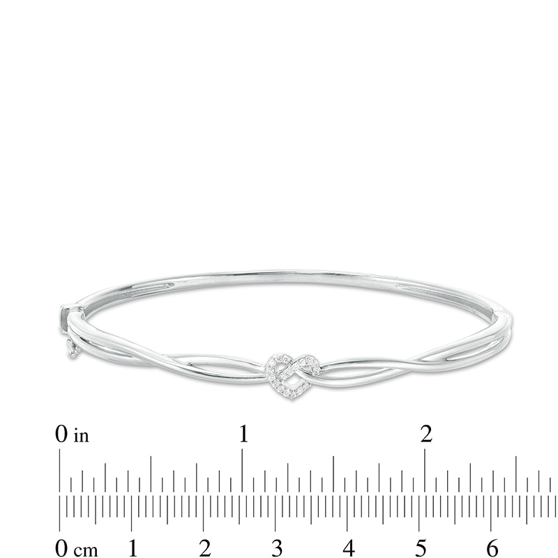 Main Image 3 of Previously Owned - 1/10 CT. T.W. Diamond Heart Knot Bangle in Sterling Silver