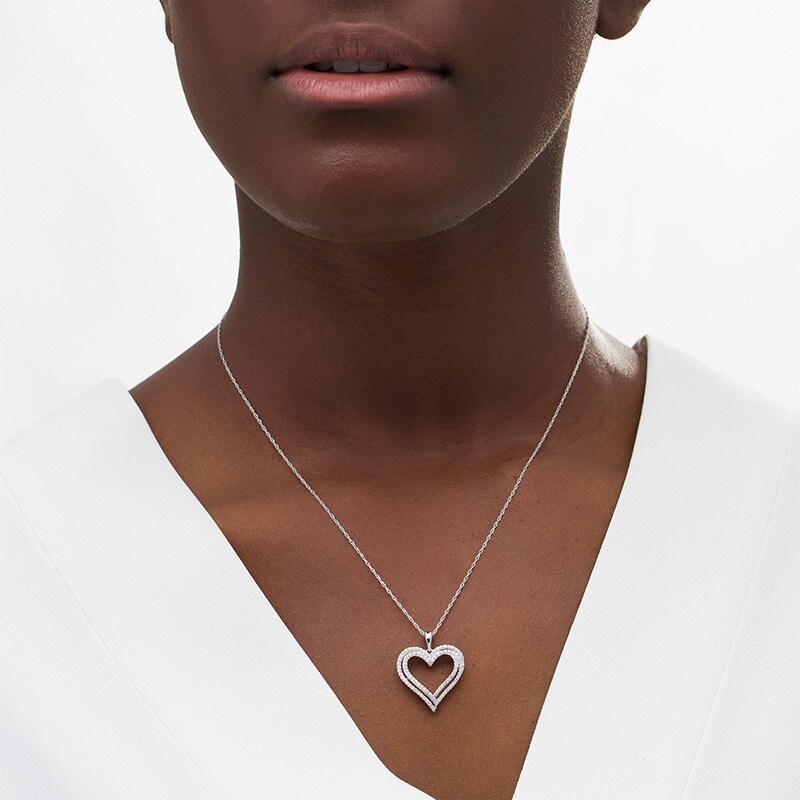 Main Image 2 of Previously Owned - 1/2 CT. T.W. Diamond Double Heart Pendant in Sterling Silver