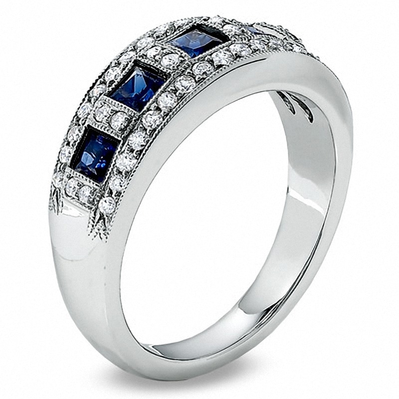 Previously Owned - 1/3 CT. T.W. Diamond and Princess-Cut Blue Sapphire Anniversary Band in 14K White Gold