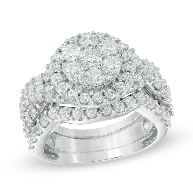 Previously Owned - 2-1/2 CT. T.W. Diamond Cluster Twist Three Piece Bridal Set in 14K White Gold