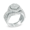 Thumbnail Image 1 of Previously Owned - 2-1/2 CT. T.W. Diamond Cluster Twist Three Piece Bridal Set in 14K White Gold