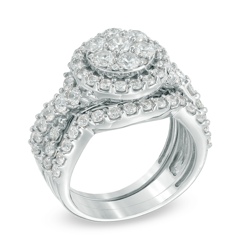 Previously Owned - 2-1/2 CT. T.W. Diamond Cluster Twist Three Piece Bridal Set in 14K White Gold