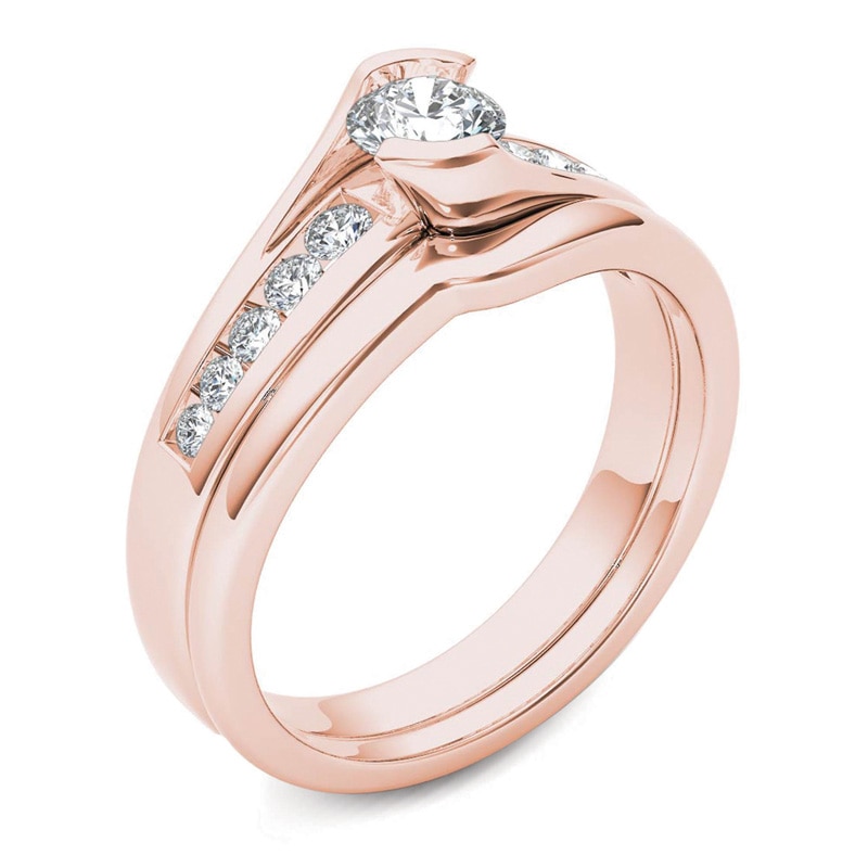 Previously Owned - 1/2 CT. T.W. Diamond Bypass Bridal Set in 14K Rose Gold