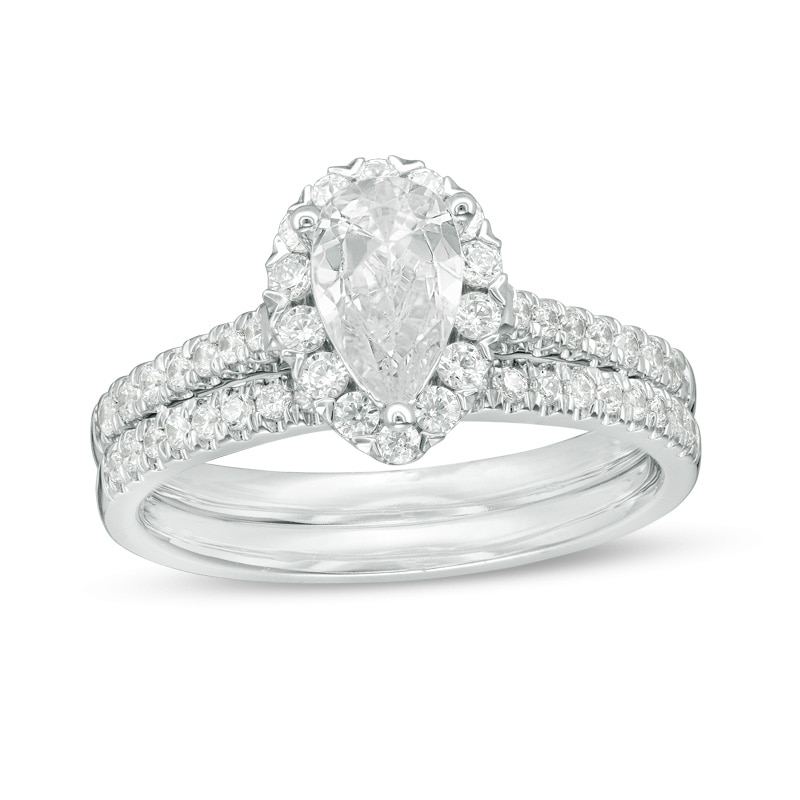 Previously Owned - 1-1/5 CT. T.W. Pear-Shaped Diamond Frame Bridal Set in 14K White Gold (I/SI2)