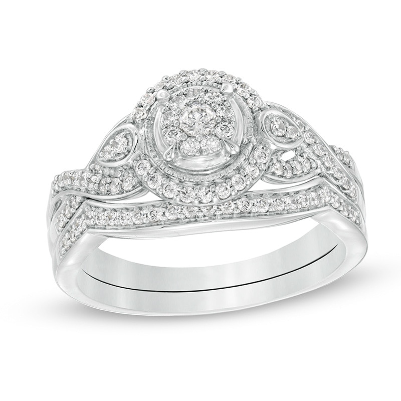 Main Image 1 of Previously Owned - 3/8 CT. T.W. Diamond Frame Twist Shank Vintage-Style Bridal Set in 10K White Gold