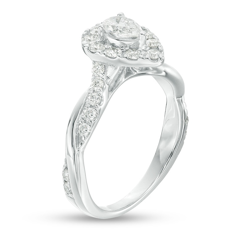 Previously Owned - 7/8 CT. T.W. Pear-Shaped Diamond Frame Twist Shank Engagement Ring in 10K White Gold